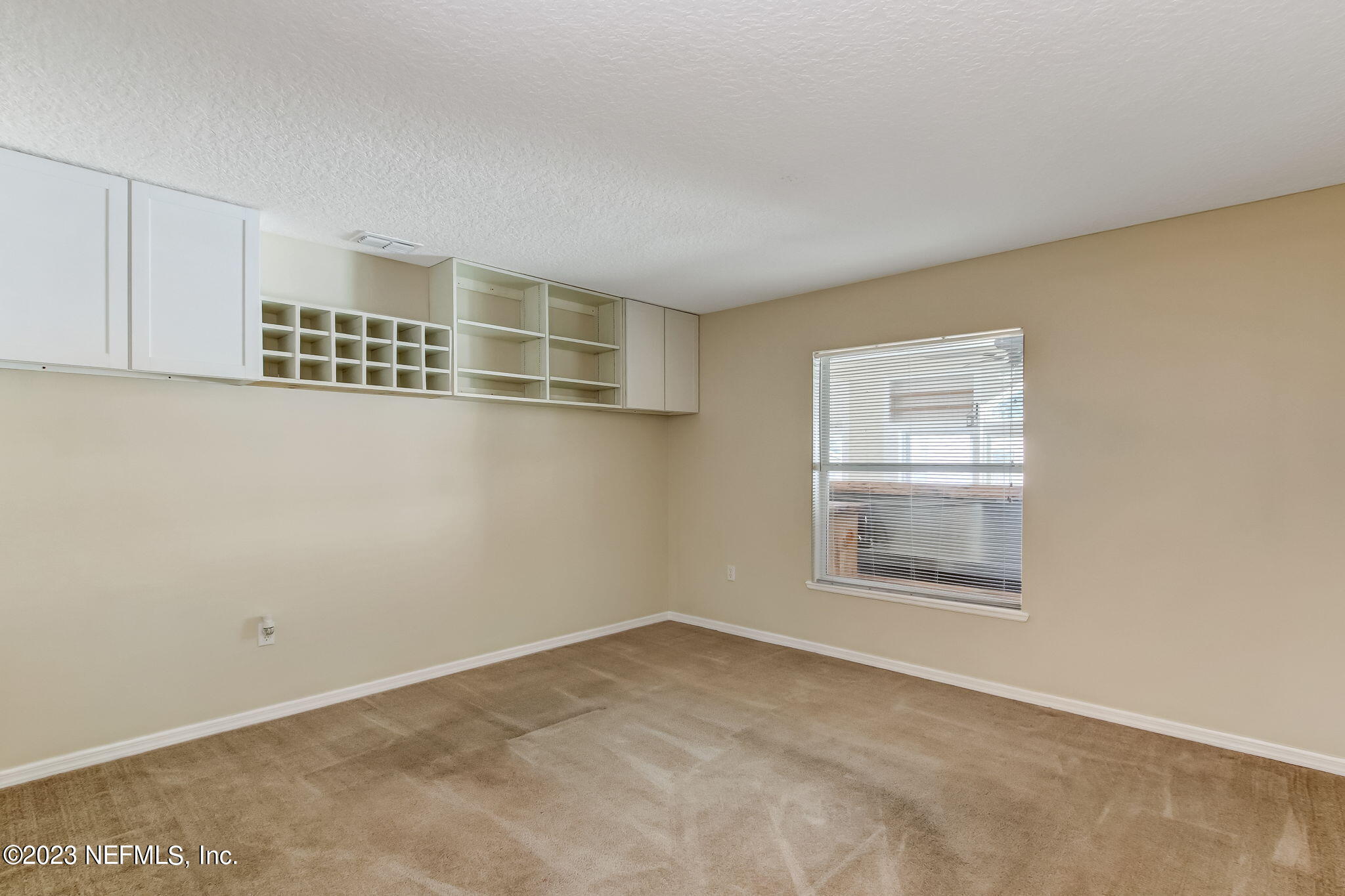 54005 Turning Leaf Drive Callahan, FL 32011 - Photo 18 of 54 a view of an empty room with a window