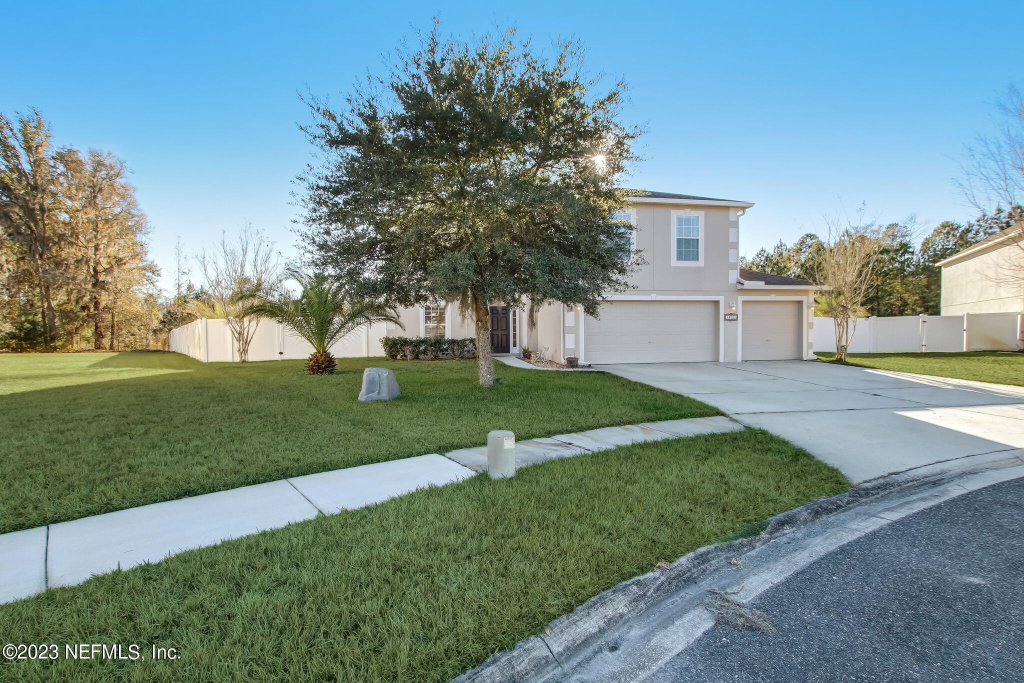 54005 Turning Leaf Drive Callahan, FL 32011 - Photo 2 of 54 a view of a house with a yard