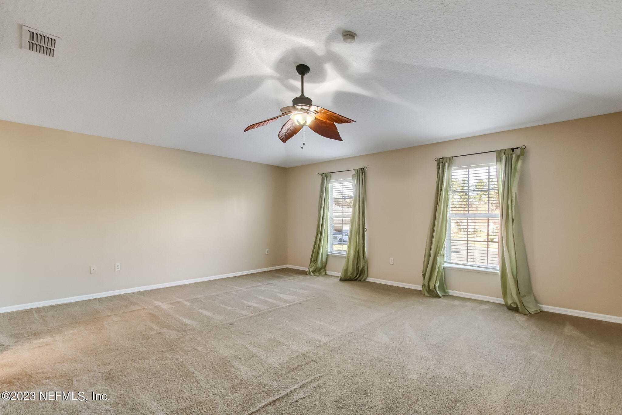 54005 Turning Leaf Drive Callahan, FL 32011 - Photo 23 of 54 a view of an empty room with a window