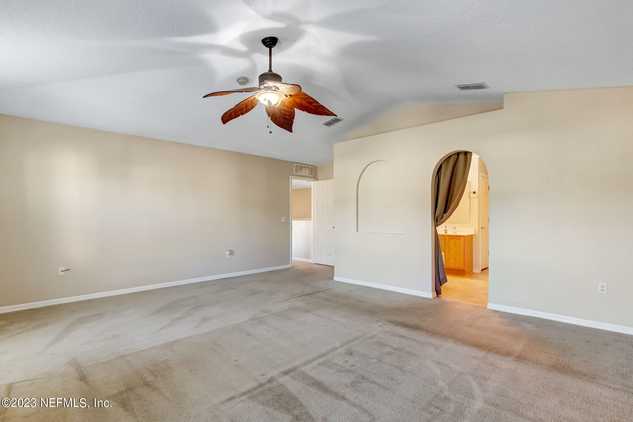 54005 Turning Leaf Drive Callahan, FL 32011 - Photo 24 of 54 a view of a room with a chandelier