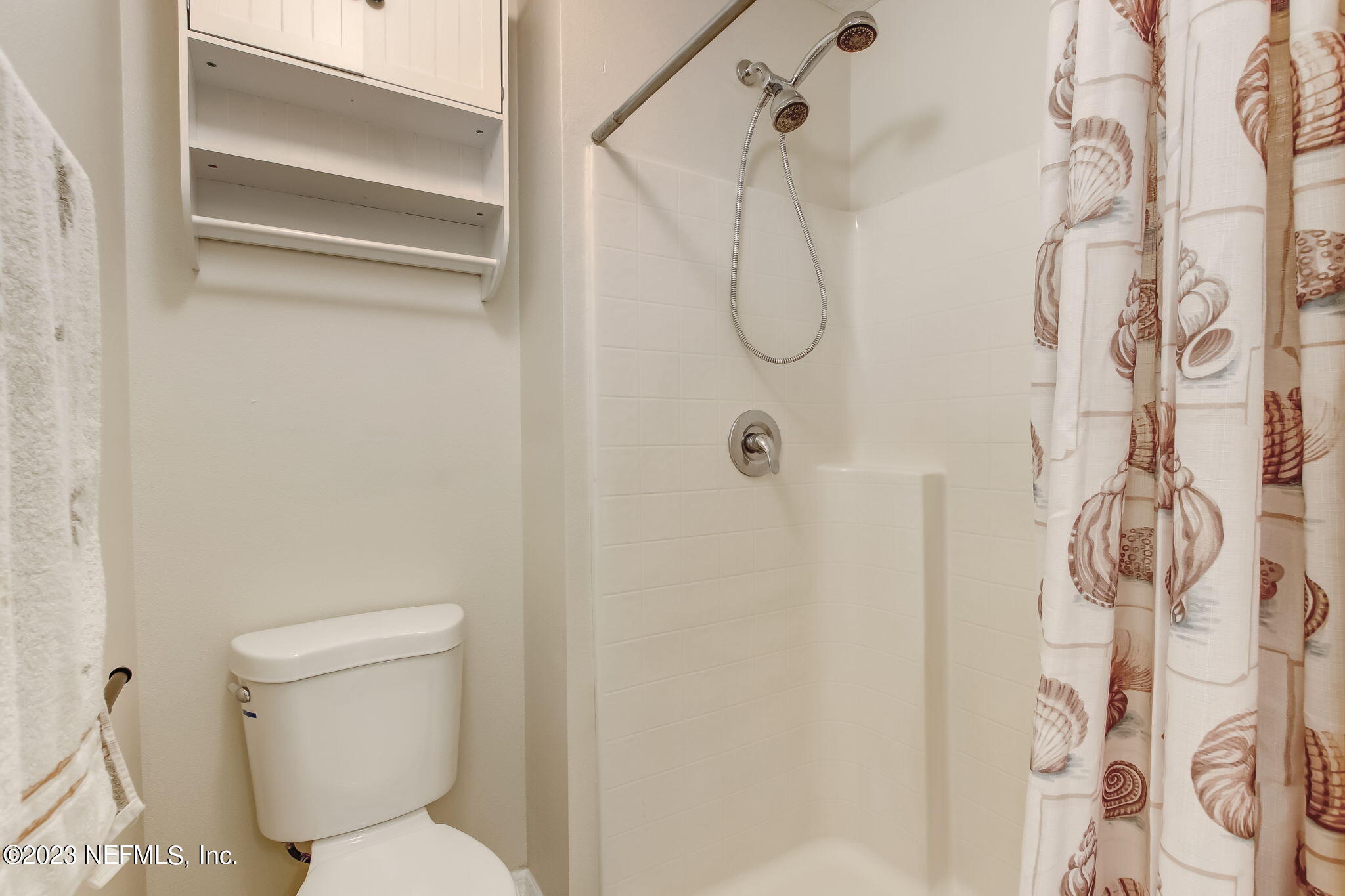54005 Turning Leaf Drive Callahan, FL 32011 - Photo 27 of 54 a bathroom with a toilet and shower