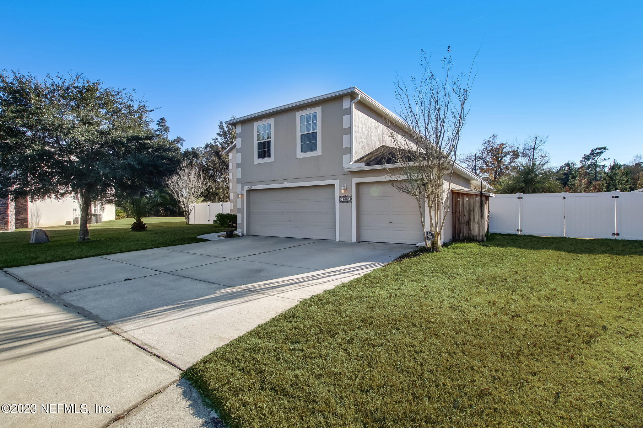 54005 Turning Leaf Drive Callahan, FL 32011 - Photo 3 of 54 a view of a house with a yard