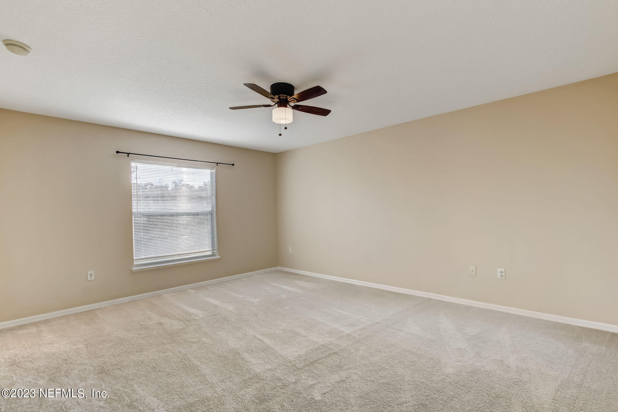 54005 Turning Leaf Drive Callahan, FL 32011 - Photo 36 of 54 a view of an empty room with a window