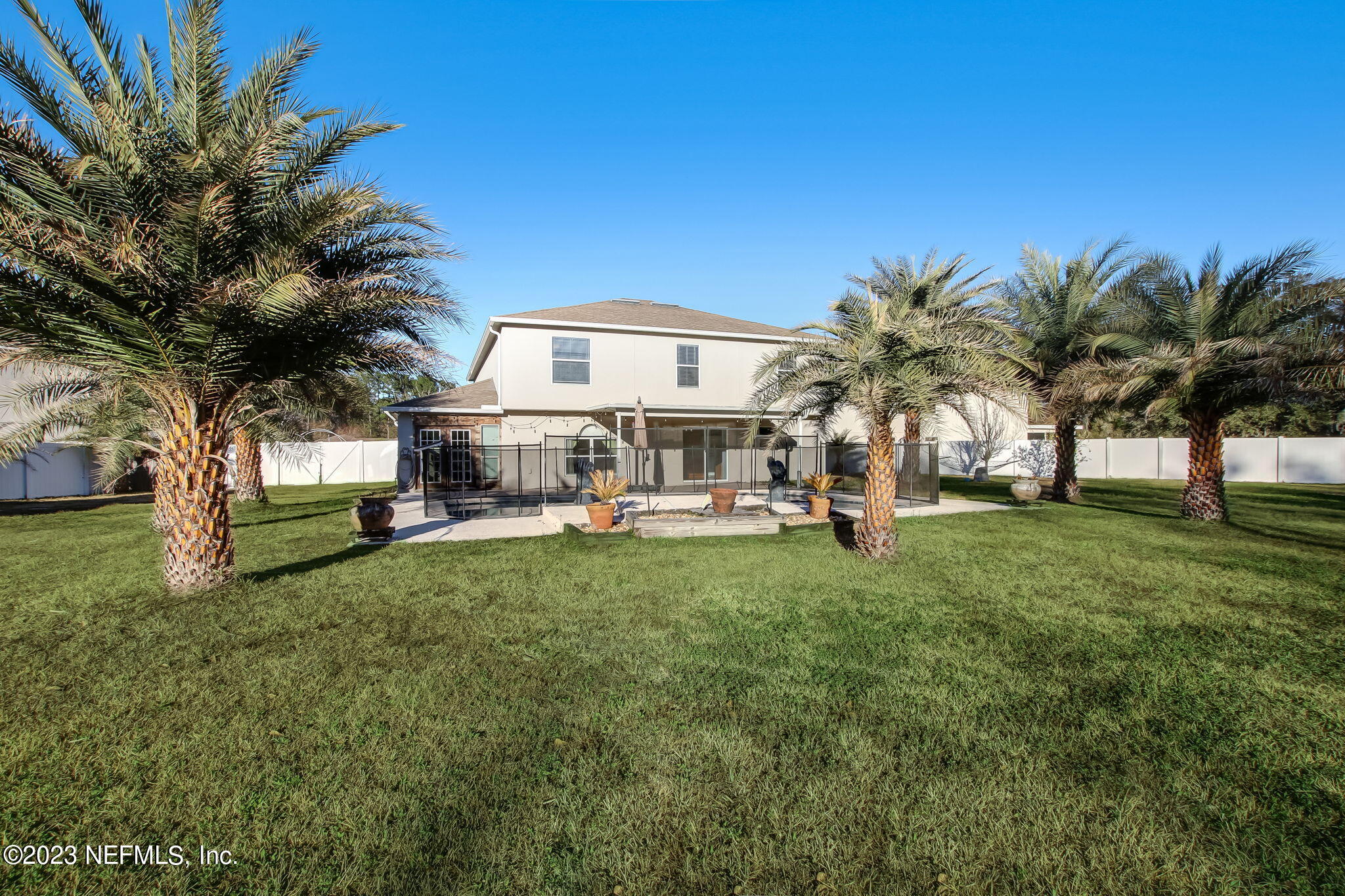 54005 Turning Leaf Drive Callahan, FL 32011 - Photo 48 of 54 a view of a house with a yard