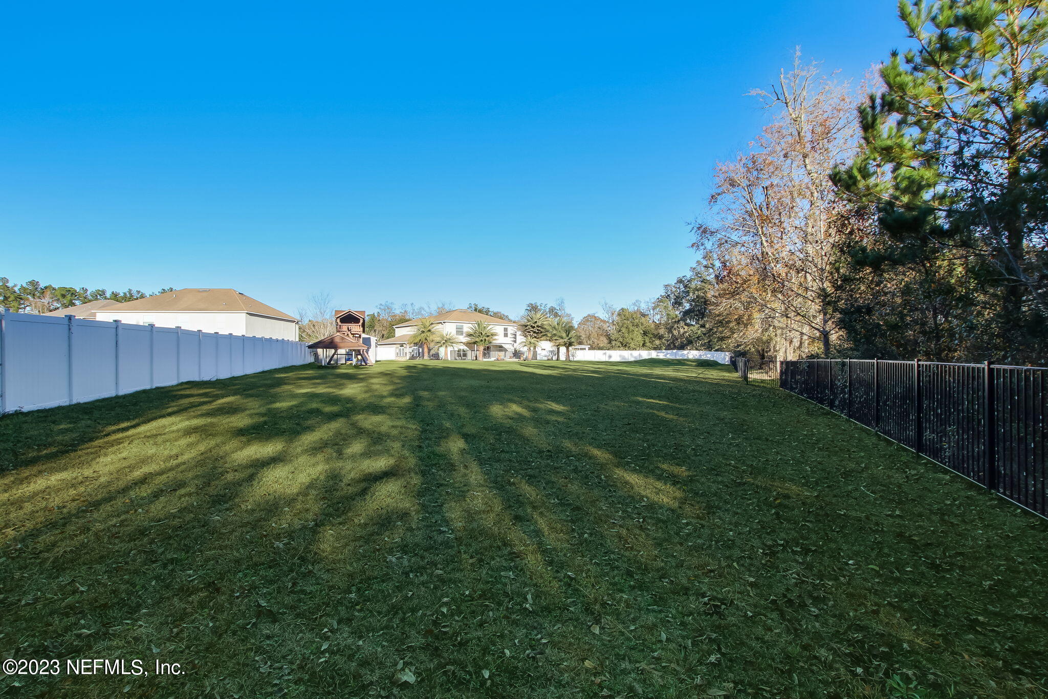 54005 Turning Leaf Drive Callahan, FL 32011 - Photo 49 of 54 a view of garden with trees