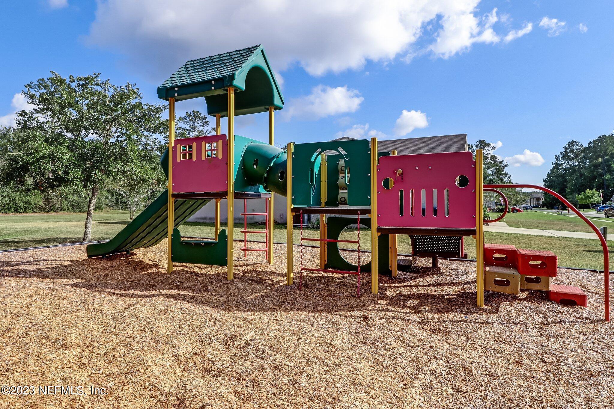 54005 Turning Leaf Drive Callahan, FL 32011 - Photo 52 of 54 a sign on the side of a road