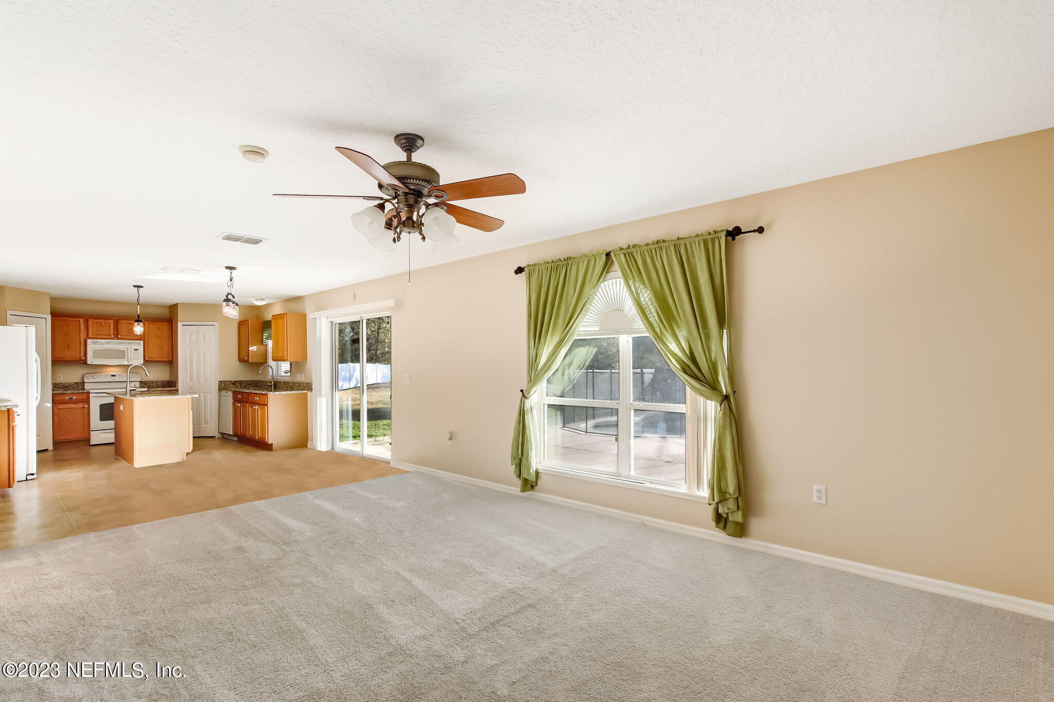 54005 Turning Leaf Drive Callahan, FL 32011 - Photo 10 of 54 a view of empty room with a ceiling fan