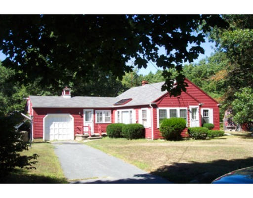 79 Mattapoisett Road Rochester, MA 02770 - Photo 1 of 16 a front view of a house with a yard and garage