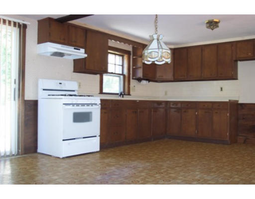 79 Mattapoisett Road Rochester, MA 02770 - Photo 11 of 16 a kitchen with stainless steel appliances granite countertop a stove a refrigerator and a microwave