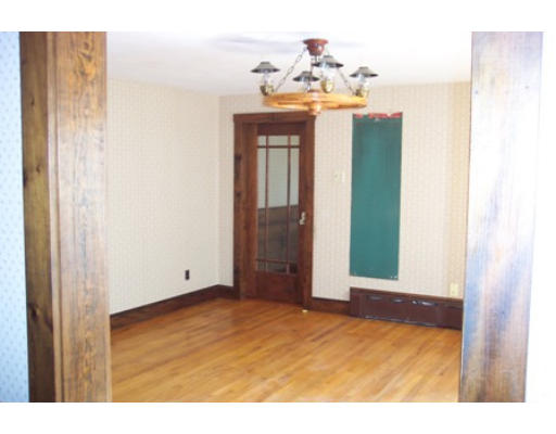 79 Mattapoisett Road Rochester, MA 02770 - Photo 12 of 16 a view of an empty room with wooden floor