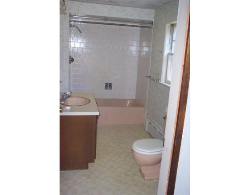79 Mattapoisett Road Rochester, MA 02770 - Photo 14 of 16 a bathroom with a granite countertop sink toilet and shower