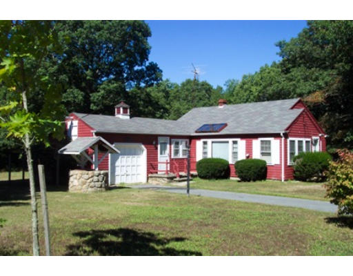 79 Mattapoisett Road Rochester, MA 02770 - Photo 2 of 16 a front view of a house with a yard