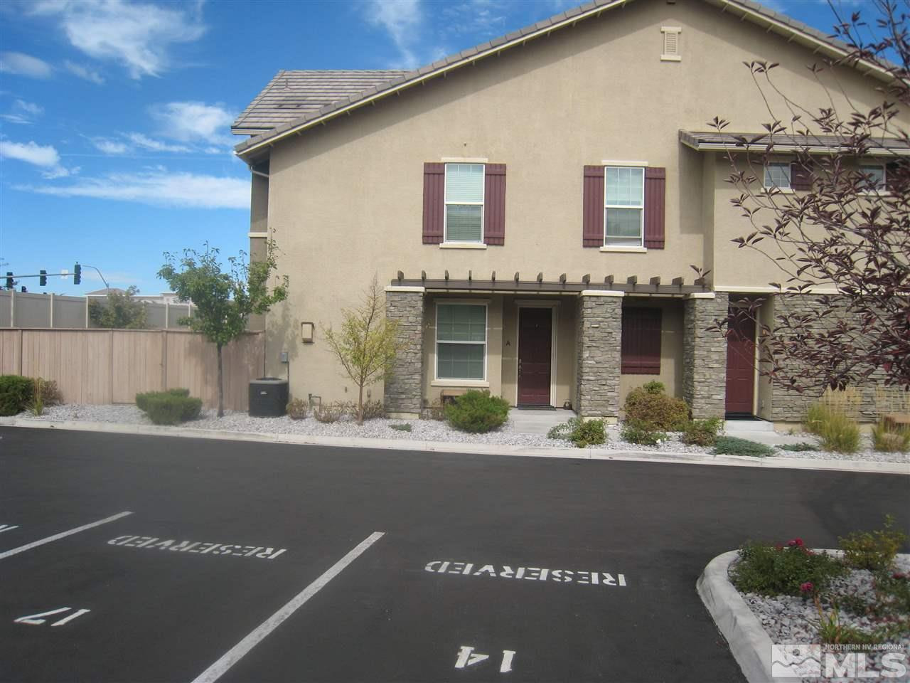1765 Wind Ranch Road Reno, NV 89521 - Photo 1 of 1 front view of a house with a street