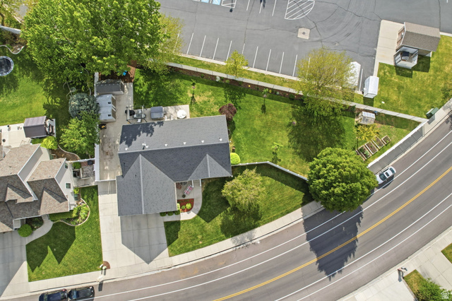 1816 River Bottom Road Springville, UT 84663 - Photo 36 of 37 Aerial perspective showcasing a property with a gray shingle roof and a spacious rear yard