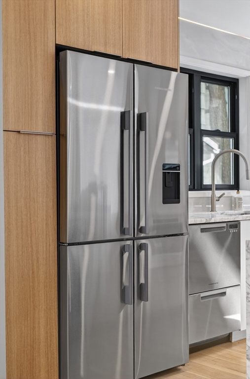 29 Line Street Cambridge, MA 02138 - Photo 11 of 42 a metallic refrigerator freezer and a microwave