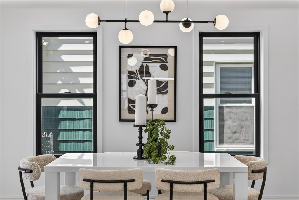 29 Line Street Cambridge, MA 02138 - Photo 20 of 42 a view of a dining room with furniture and window