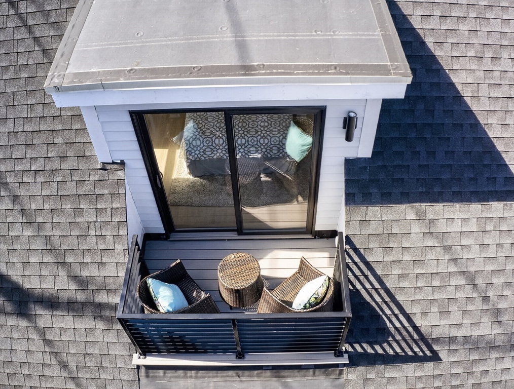 29 Line Street Cambridge, MA 02138 - Photo 26 of 42 a fireplace with a rug