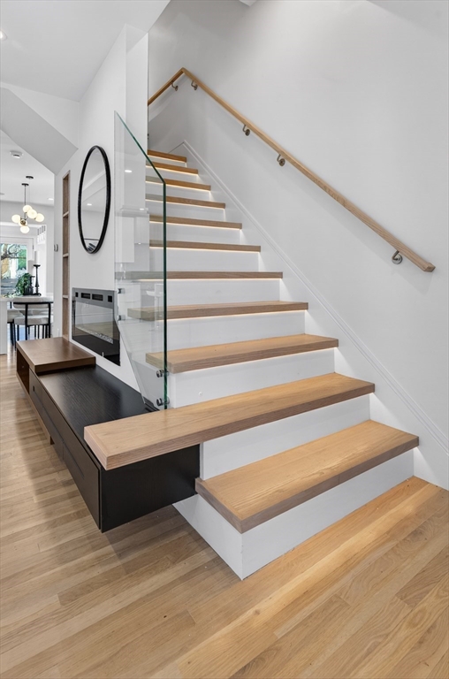 29 Line Street Cambridge, MA 02138 - Photo 29 of 42 a view of staircase with white walls and white walls