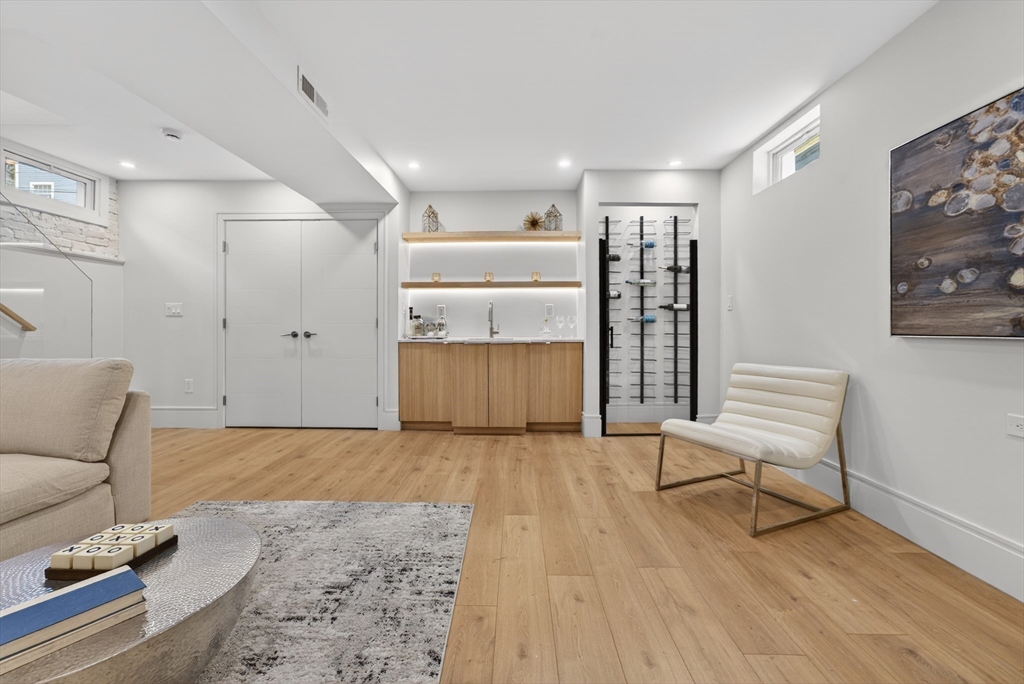 29 Line Street Cambridge, MA 02138 - Photo 31 of 42 a view of livingroom with furniture and wooden floor