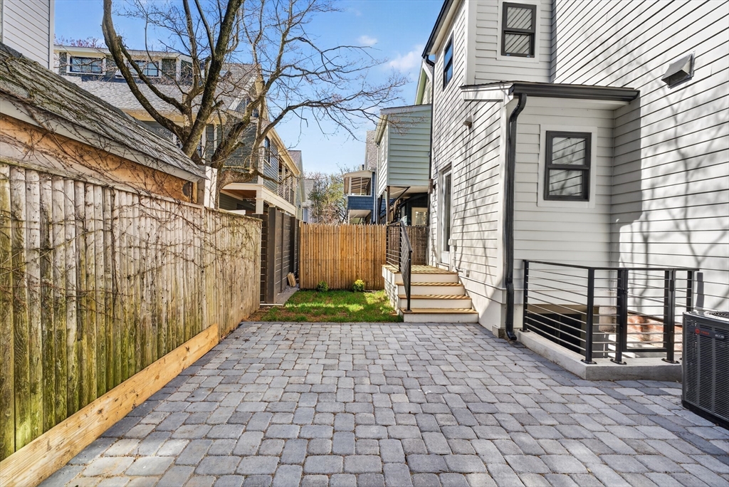 29 Line Street Cambridge, MA 02138 - Photo 40 of 42 a view of a house with a yard