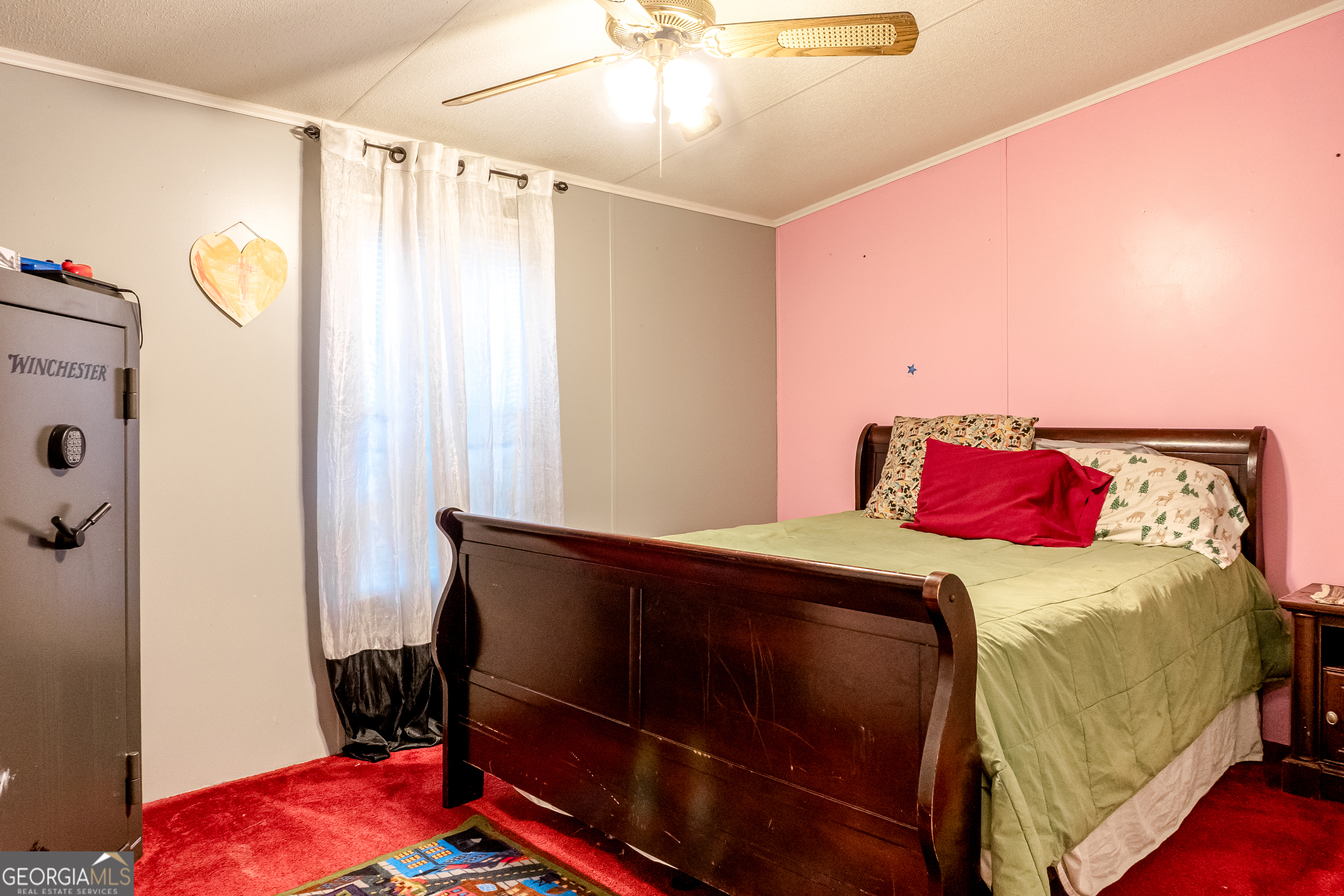 1214 Holiday S Drive Rentz, GA 31075 - Photo 15 of 19 a bedroom with a bed and a dresser in it