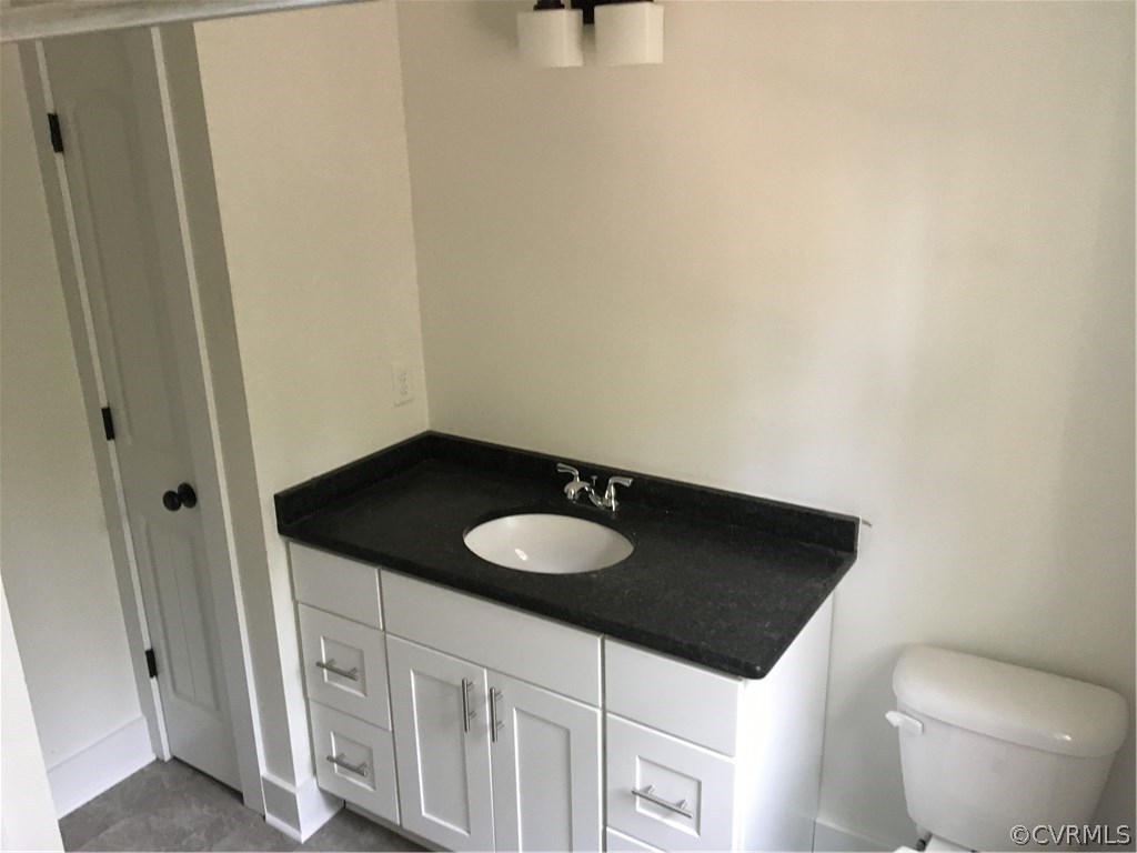 3936 Wood Dale Road Chester, VA 23831 - Photo 32 of 34 a close view of cabinet