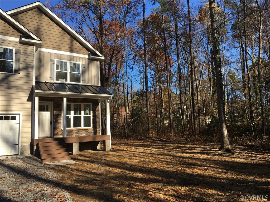 3936 Wood Dale Road Chester, VA 23831 - Photo 4 of 34 a view of a house with a yard