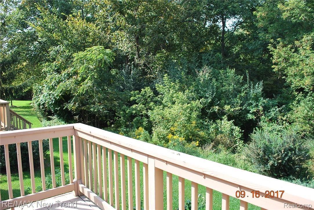 21680 River Ridge Trail, Unit 197 Farmington, MI 48335 - Photo 3 of 17 VIEW FROM REAR DECK