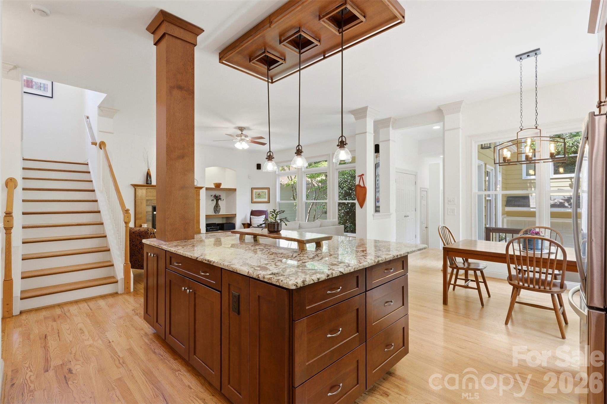 739 Julia Street Fort Mill, SC 29708 - Photo 16 of 48 a dining table with chairs and chandelier