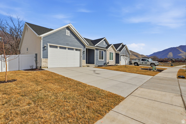 677 East 800 S Street Springville, UT 84663 - Photo 30 of 35 Ranch-style home featuring a mountain view, a garage, and driveway