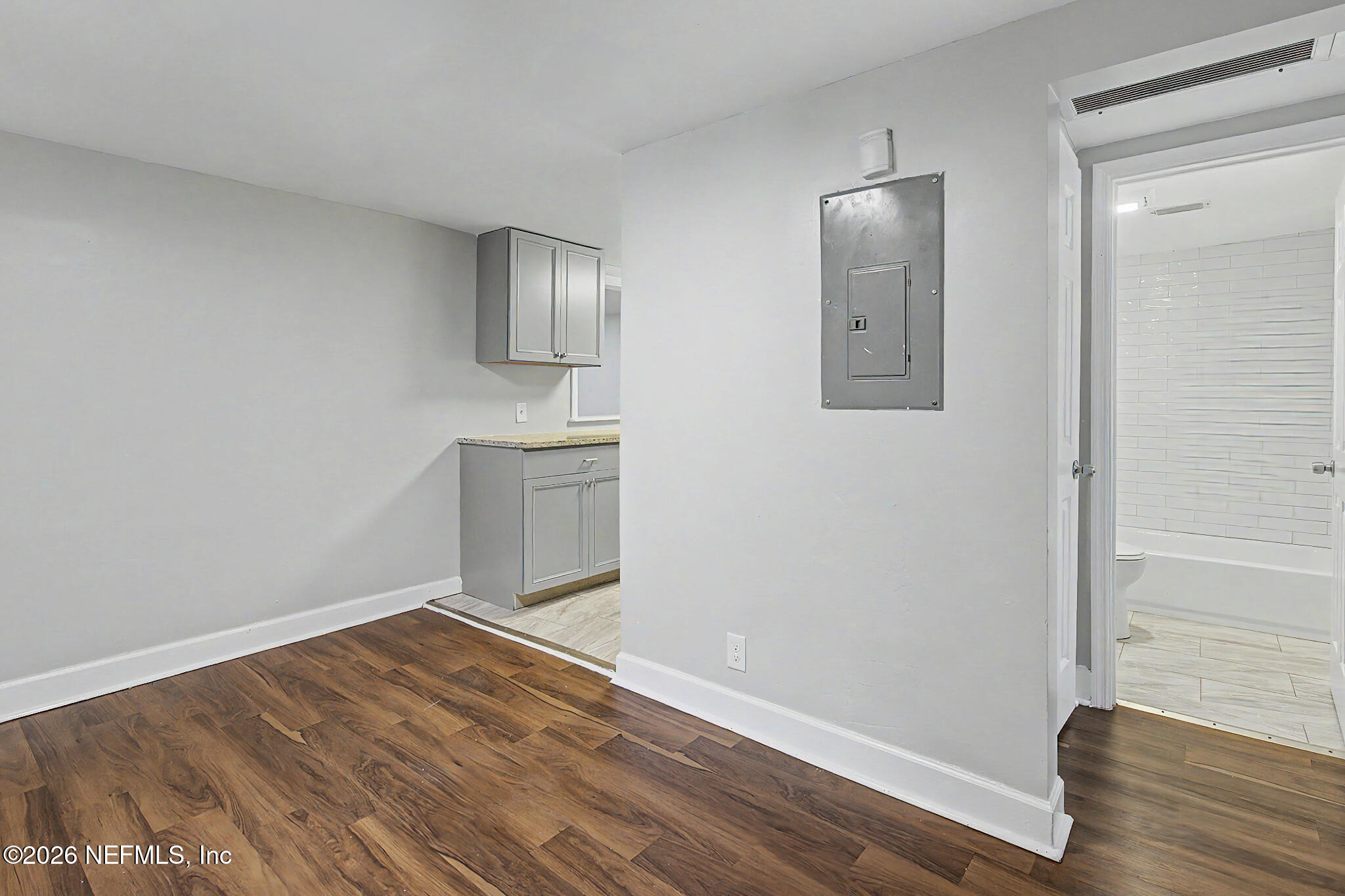 2625 Kohn Road Jacksonville, FL 32210 - Photo 9 of 34 wooden floor in an empty room
