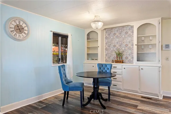 a kitchen with a refrigerator stove and sink
