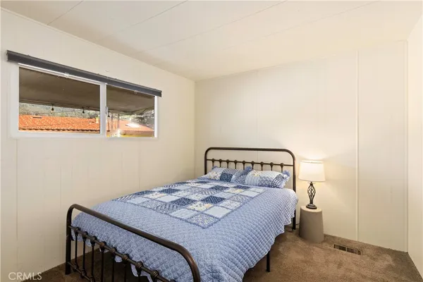 a bathroom with a sink a mirror and a shower