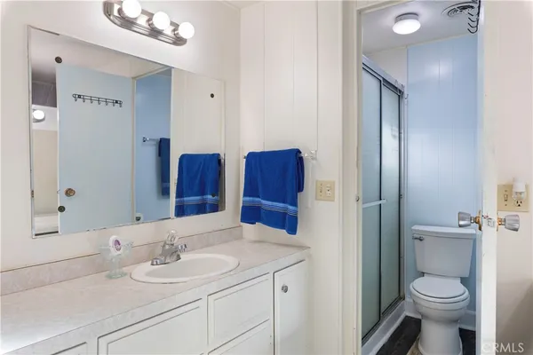 a bathroom with a sink and a toilet