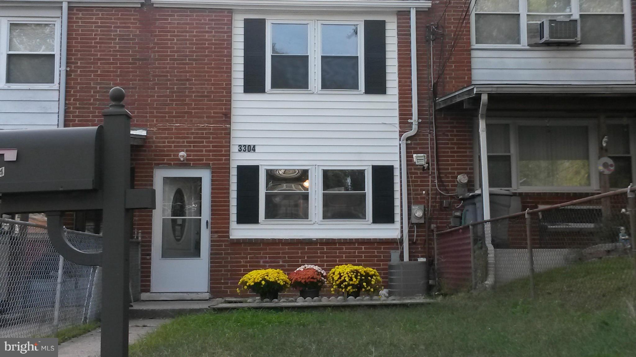 3304 Bero Road Baltimore, MD 21227 - Photo 1 of 27 a view of house with backyard