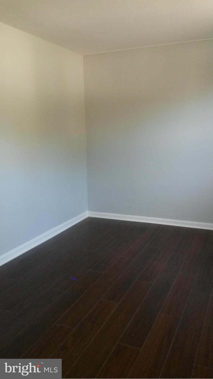 3304 Bero Road Baltimore, MD 21227 - Photo 22 of 27 a view of a room with an empty space