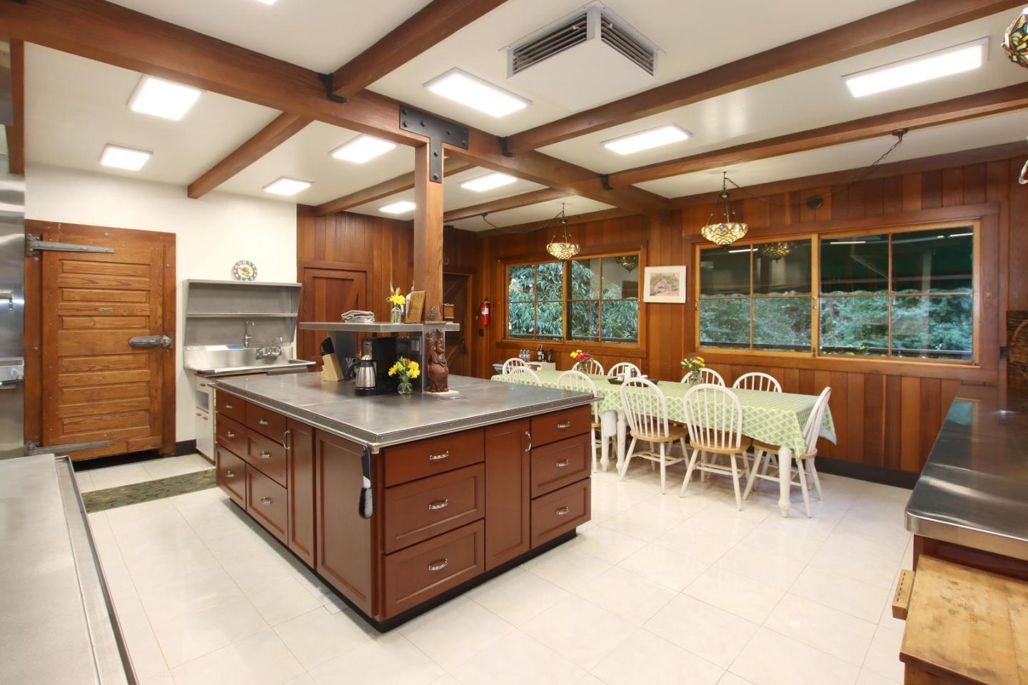 16770 Redwood Lodge Road Los Gatos, CA 95033 - Photo 102 of 122 a kitchen with stainless steel appliances granite countertop a stove and a refrigerator