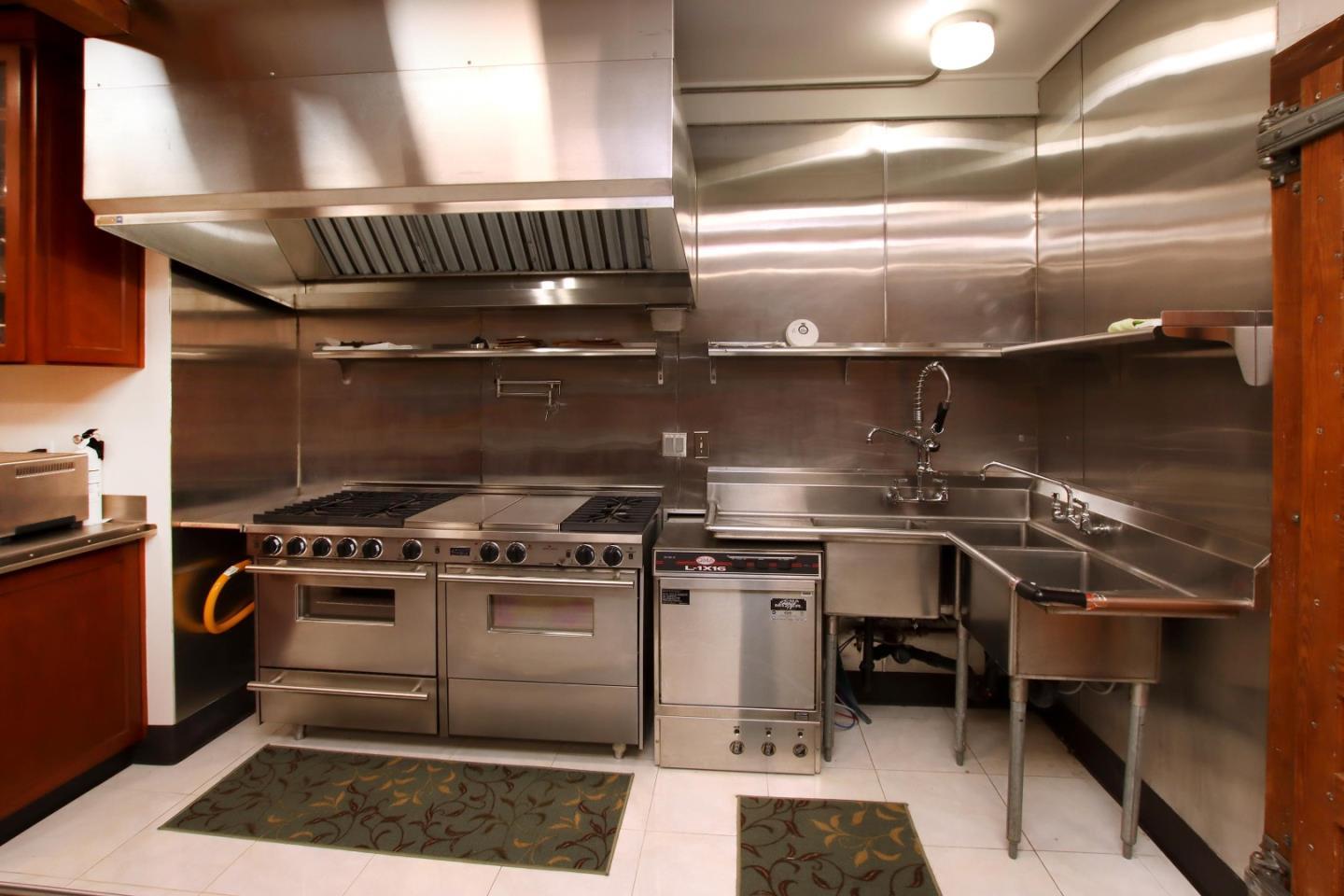 16770 Redwood Lodge Road Los Gatos, CA 95033 - Photo 105 of 122 a stove top oven sitting inside of a kitchen