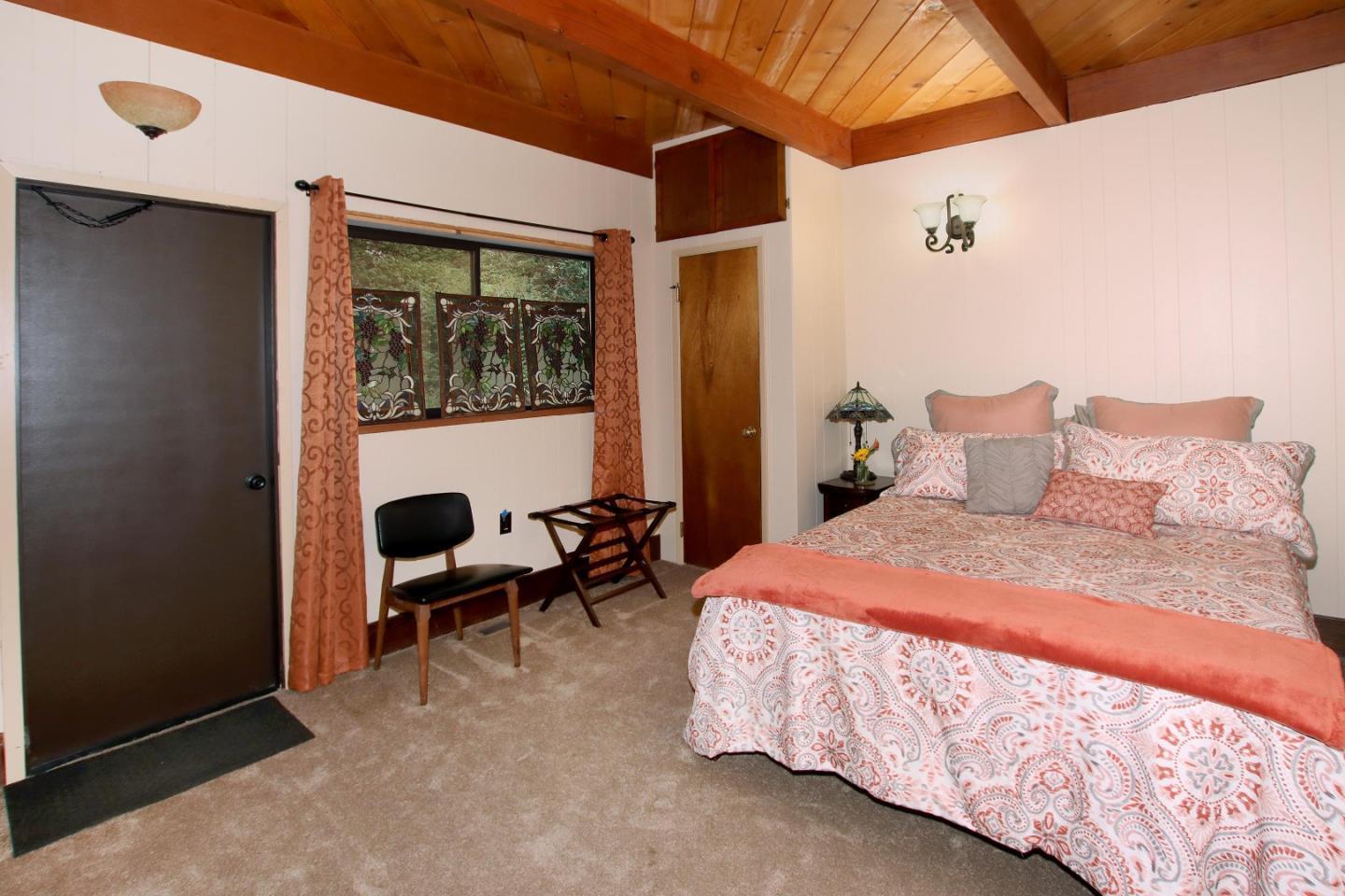 16770 Redwood Lodge Road Los Gatos, CA 95033 - Photo 112 of 122 a bedroom with a bed and a window