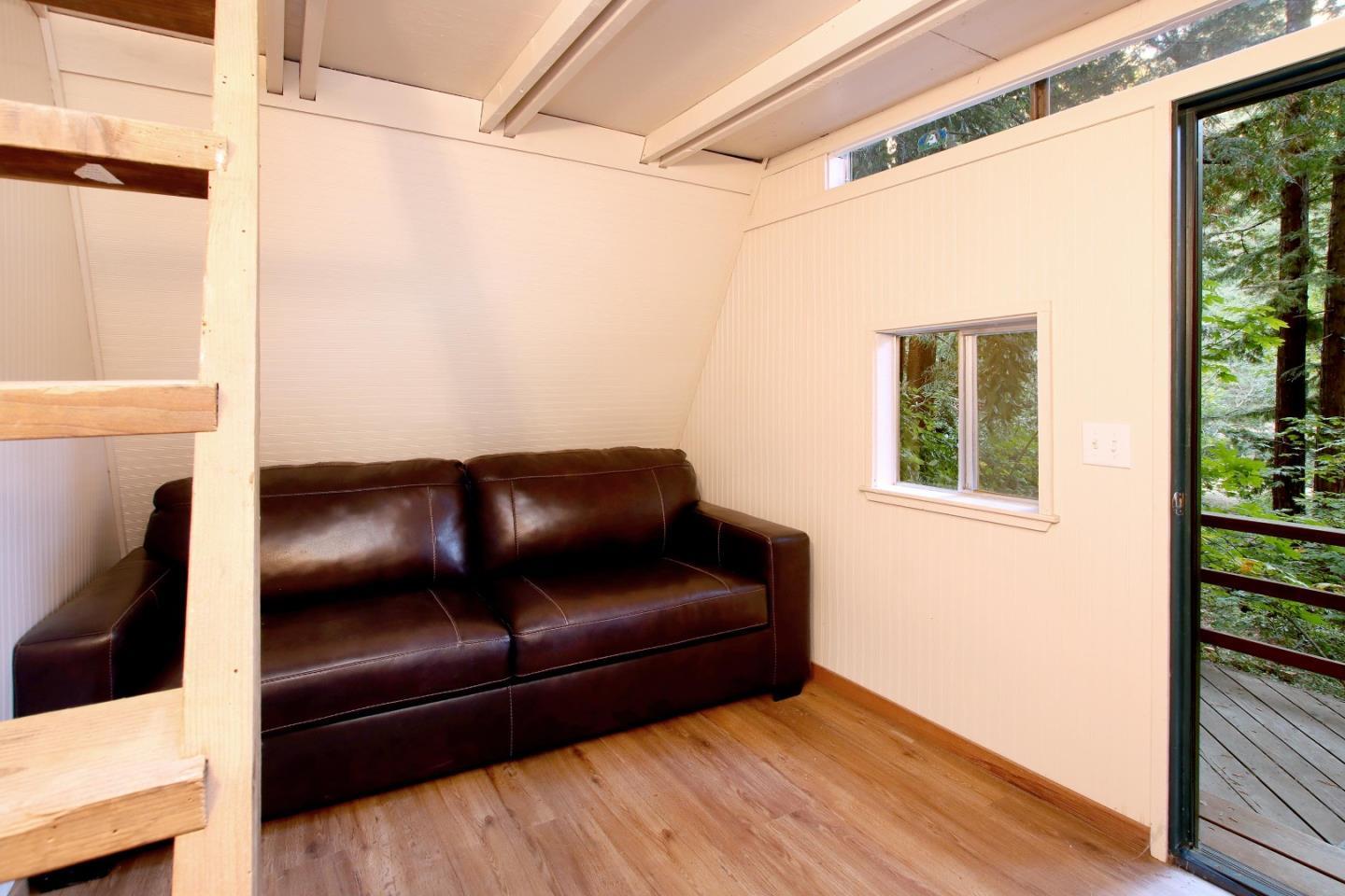 16770 Redwood Lodge Road Los Gatos, CA 95033 - Photo 16 of 122 a living room with a couch and a window