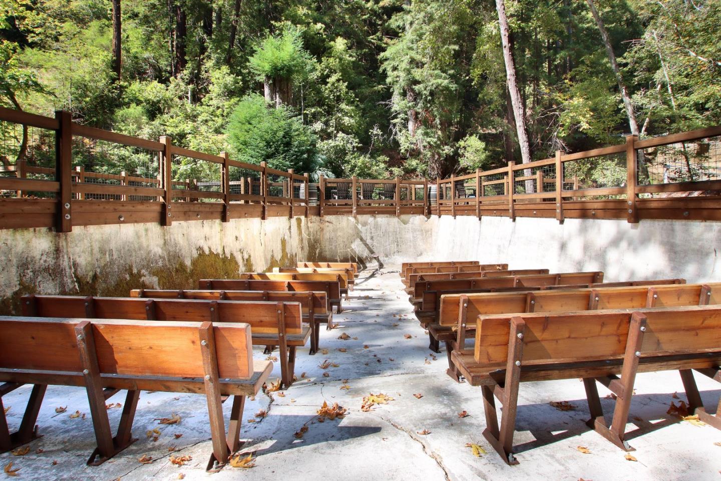 16770 Redwood Lodge Road Los Gatos, CA 95033 - Photo 27 of 122 a view of a patio with table and chairs with wooden floor and fence