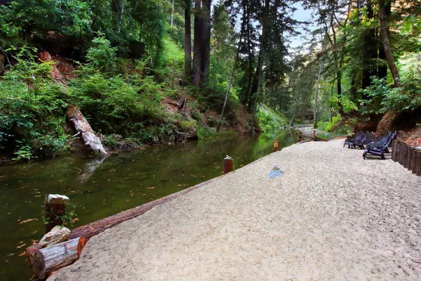 a view of an empty room with a fireplace