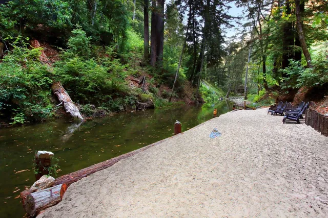 a view of an empty room with a fireplace