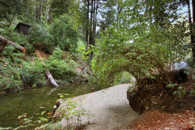 a kitchen with a table and chairs