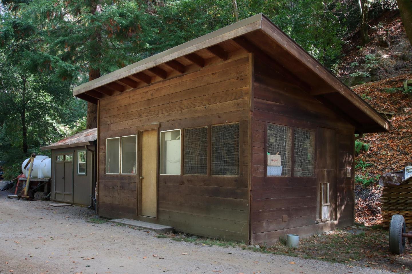 16770 Redwood Lodge Road Los Gatos, CA 95033 - Photo 38 of 122 a front view of a house with a garden
