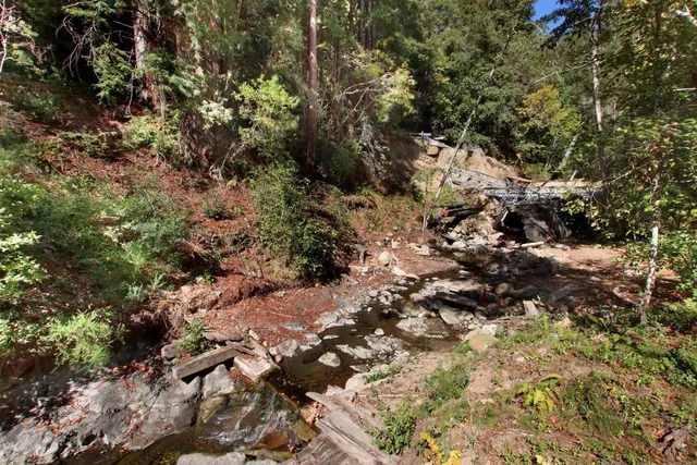 a bathroom with a sink toilet vanity and tub
