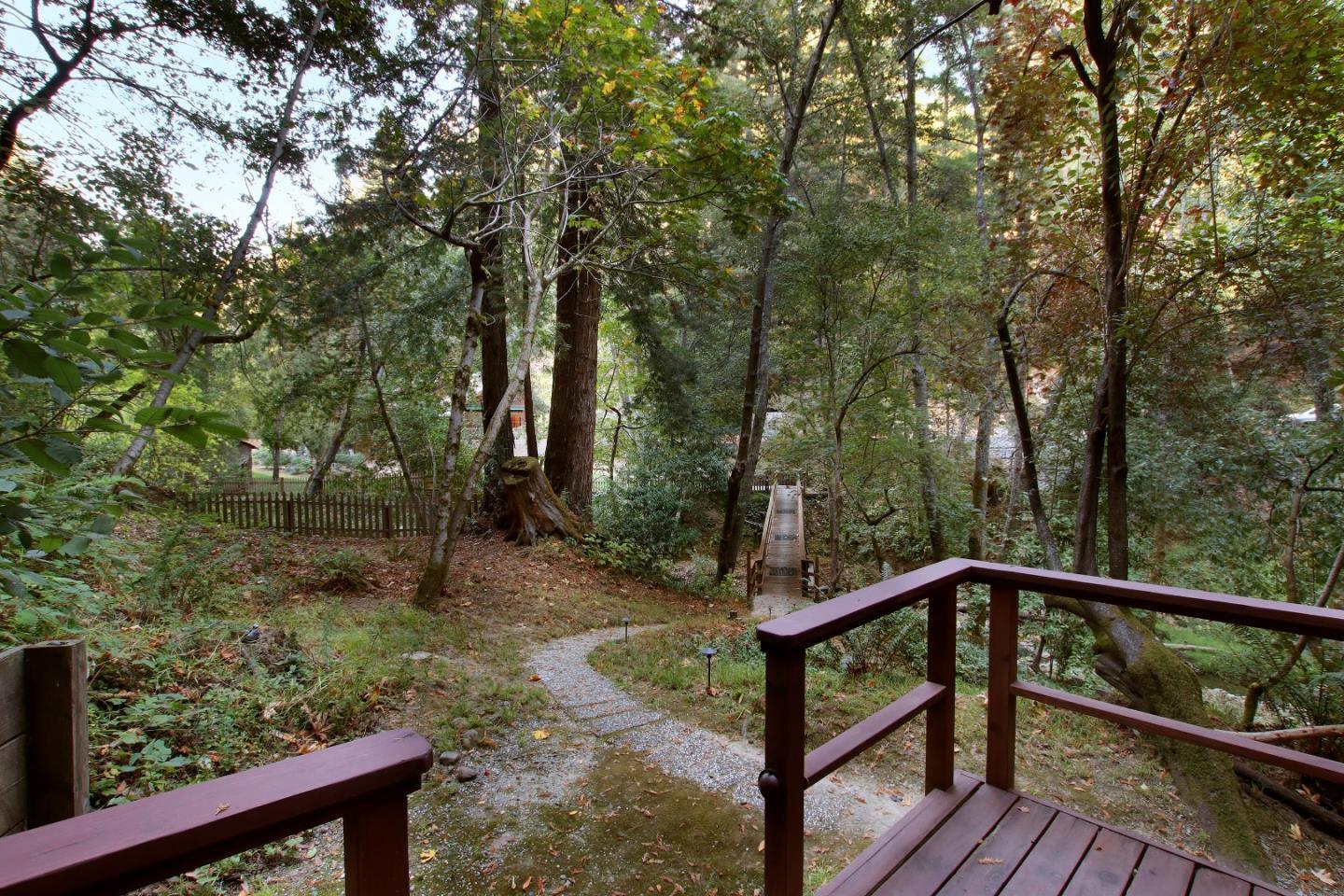 16770 Redwood Lodge Road Los Gatos, CA 95033 - Photo 48 of 122 a view of a wooden deck with trees in the background