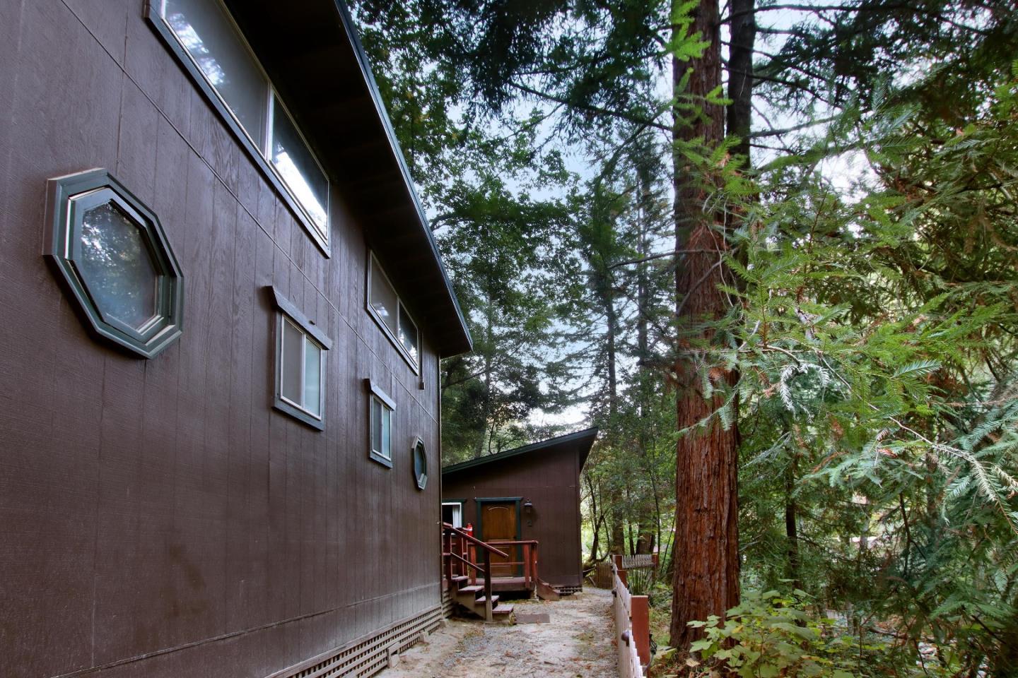 16770 Redwood Lodge Road Los Gatos, CA 95033 - Photo 56 of 122 a view of a house with a tree beside it