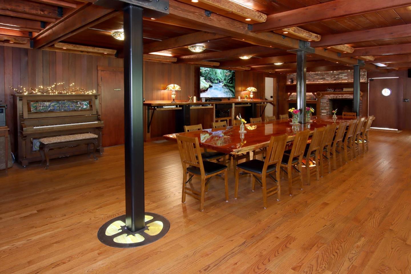 16770 Redwood Lodge Road Los Gatos, CA 95033 - Photo 73 of 122 a view of a dining room with furniture and wooden floor
