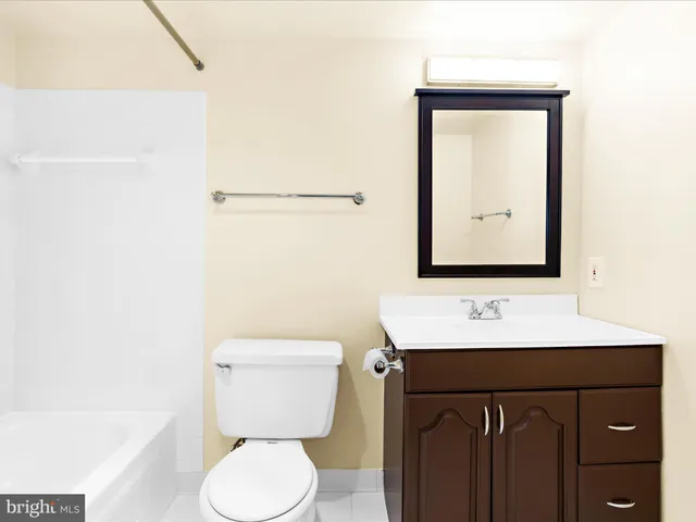 a view of a glass door with a floor to ceiling window